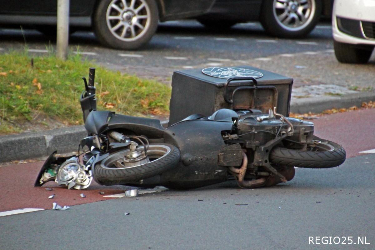 Aanrijding pizzabezorger versus auto