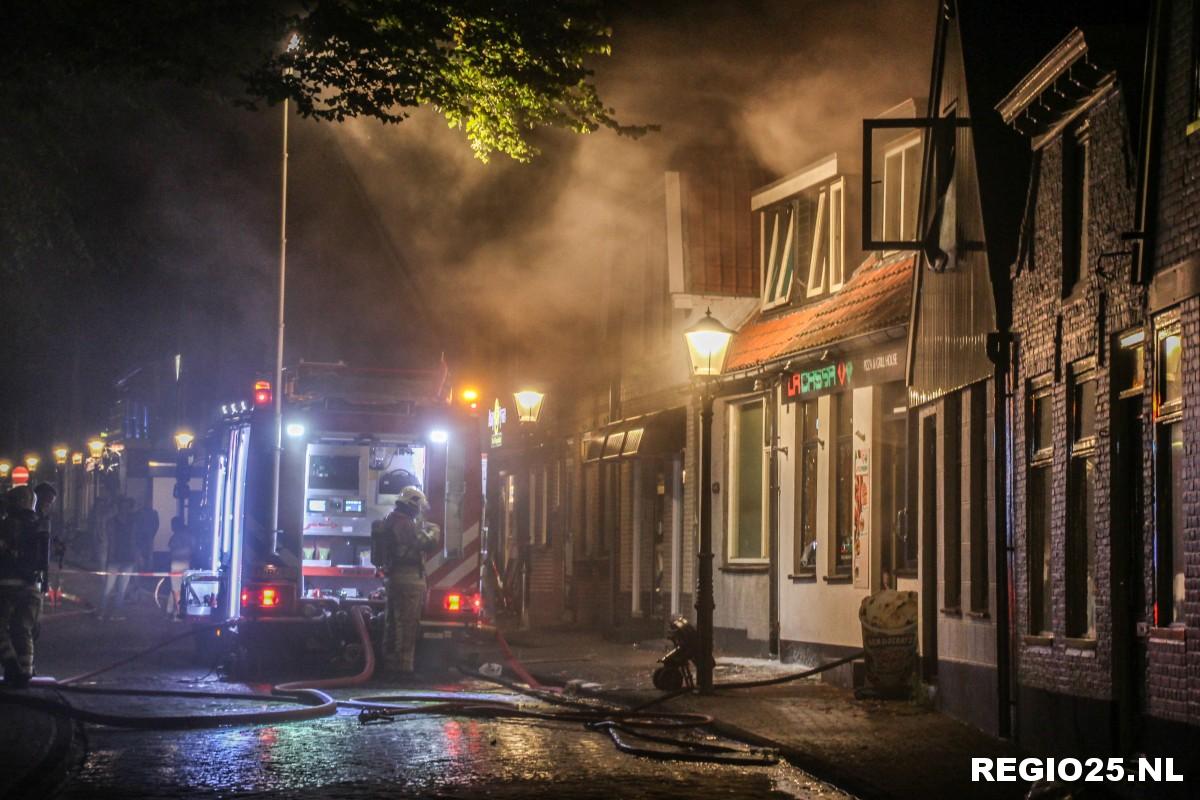 Forse brand in keuken van pizzeria