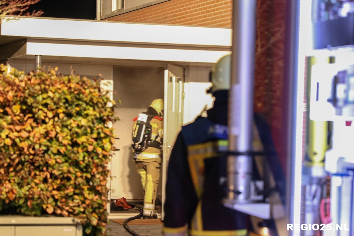 Veel rook in woning door brand