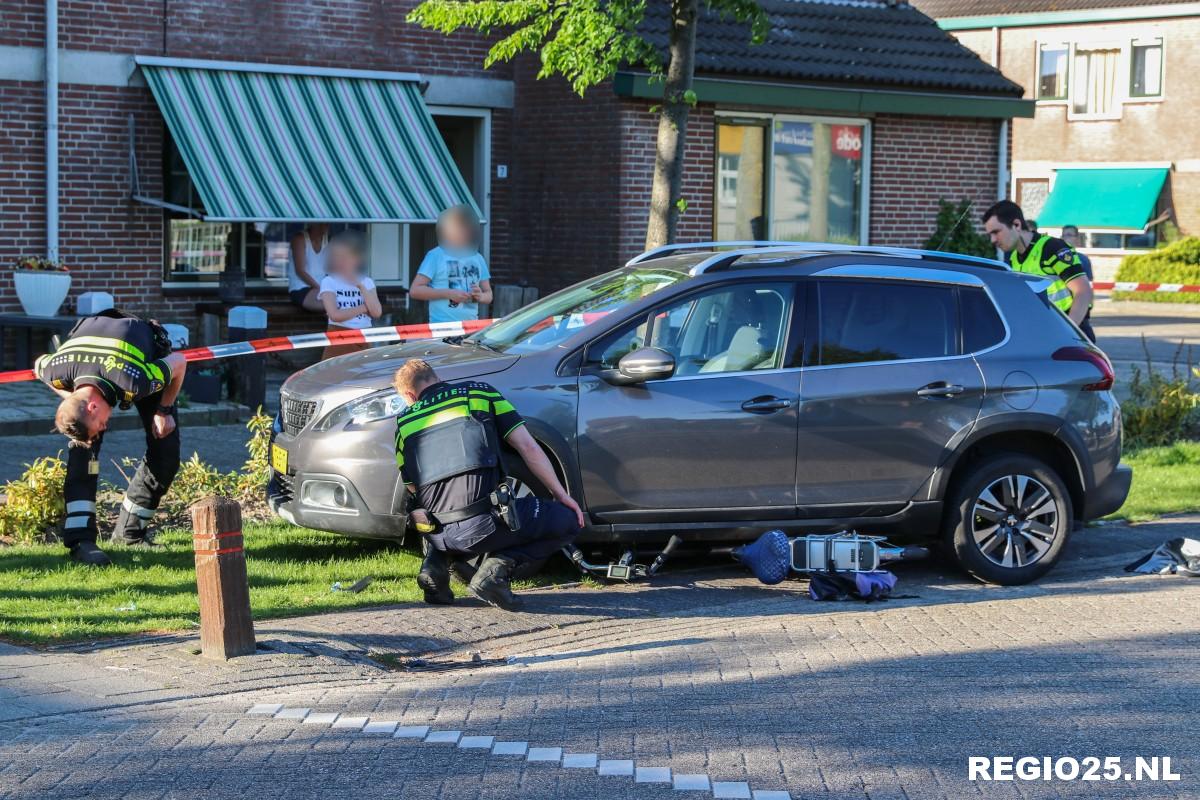 E-bike klem onder auto bij aanrijding