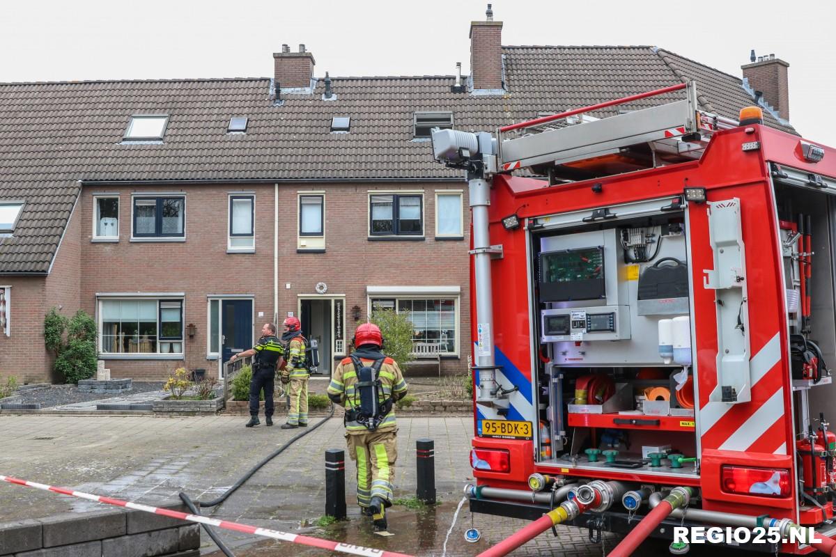 Brandweer in actie voor woningbrand