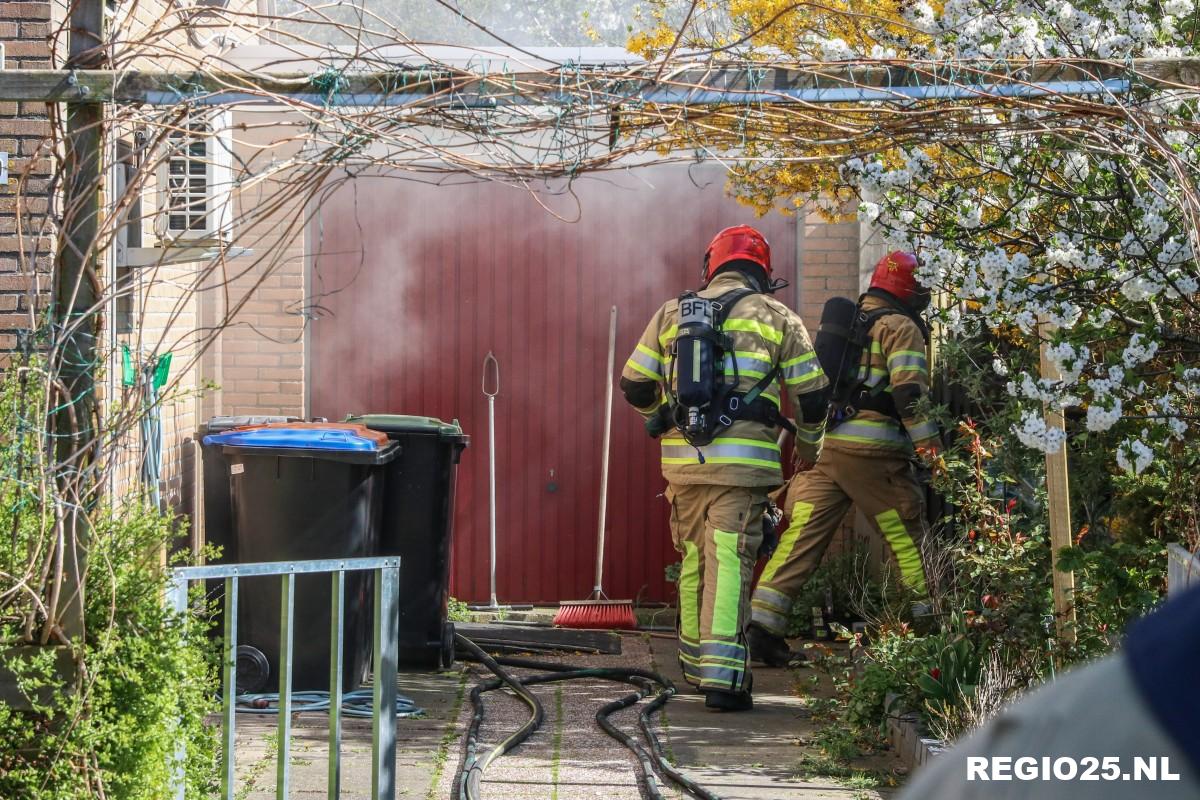 Veel rook in woning door brand