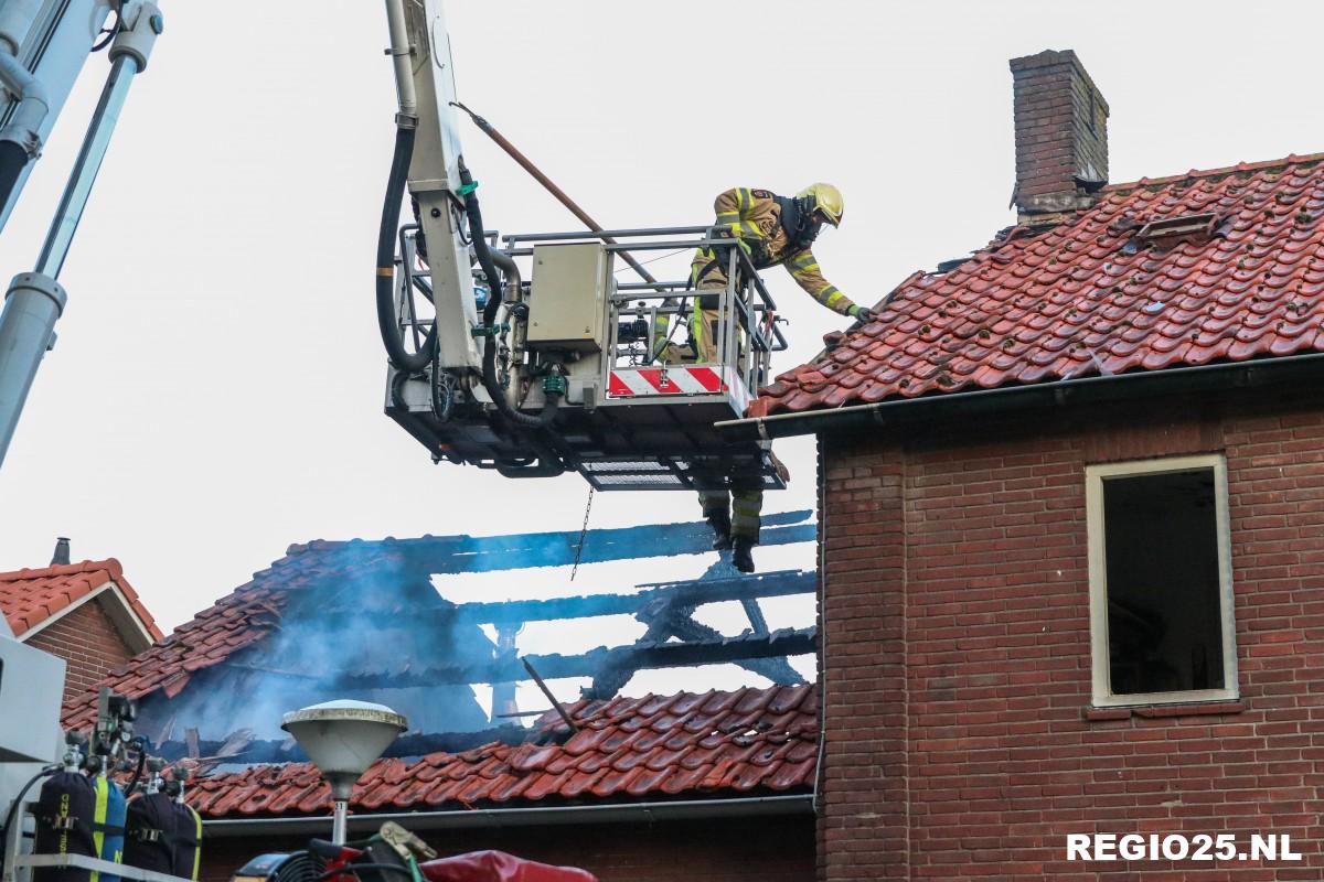 Uitslaande brand boven kachelwinkel