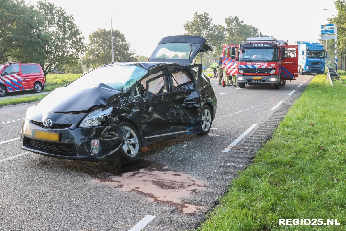 Man bekneld na botsing met vrachtwagen